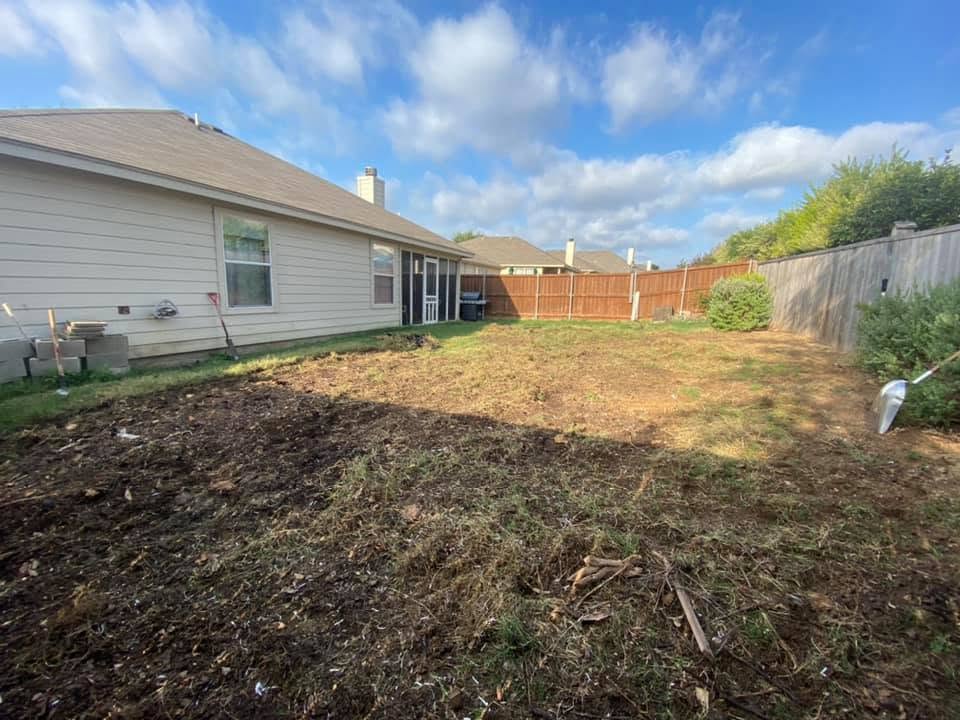 Residential backyard cleared and prepared for new sod